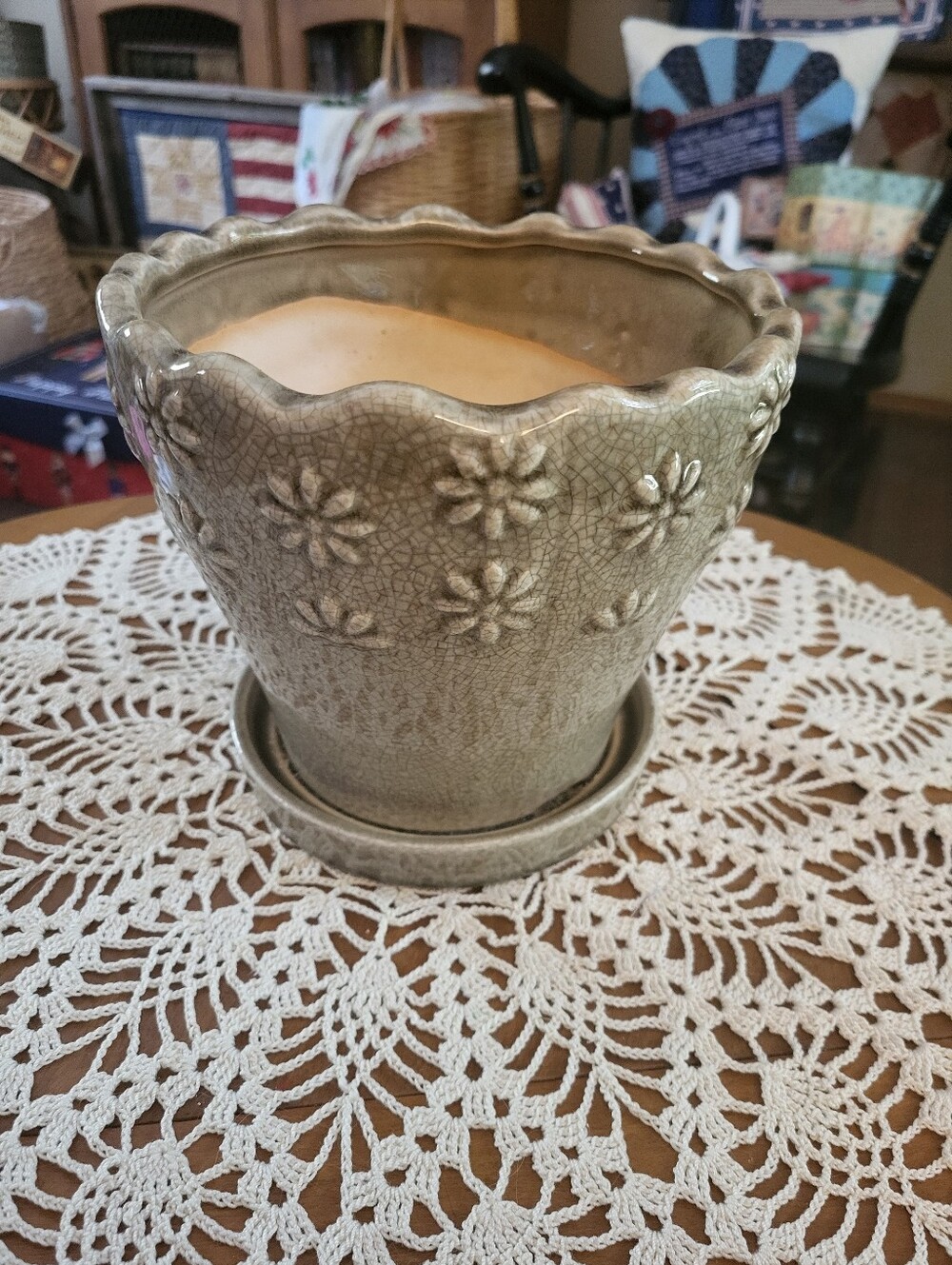 Ceramic planter with embossed floral design and attached saucer, Trendspot 9-in